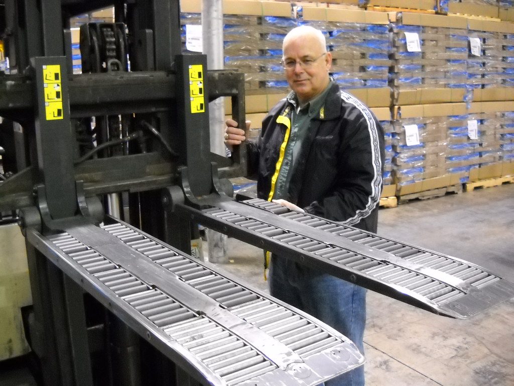 Forklift palletless handling attachment, RollerForks for slipsheets to handle corrugated boxes at Blue Line Distribution, Little Caesars