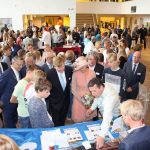 Willem-Alexander, King of the Netherlands, visits the Meijer-Group booth during a school event in Friesland.