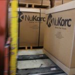 NuKorc in Australia manufacture of synthetic wine closures is using RollerForks to handle their slip-sheeted boxes.