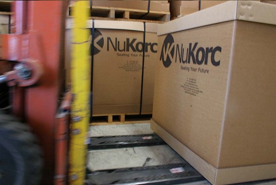 NuKorc in Australia manufacture of synthetic wine closures is using RollerForks to handle their slip-sheeted boxes.