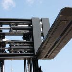 Hydraulically retractable and extendable forklift forks, KOOI-ReachForks, for loading and unloading truck and or trains on a forkpositioner, Griptech