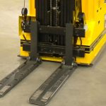 Forklift palletless handling attachment, RollerForks for slip-sheets to handle milk powder in the Netherlands