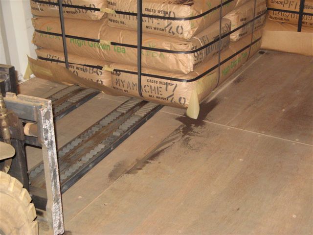 Forklift palletless handling attachment, RollerForks for slipsheets to bagged goods good like KTDA tea.