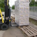 Forklift palletless handling attachment, RollerForks for slipsheets to handle beverage, beer Corona Grupo Modelo